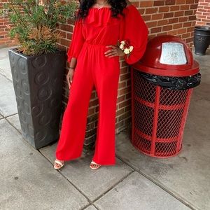 Red off the shoulder jump suit